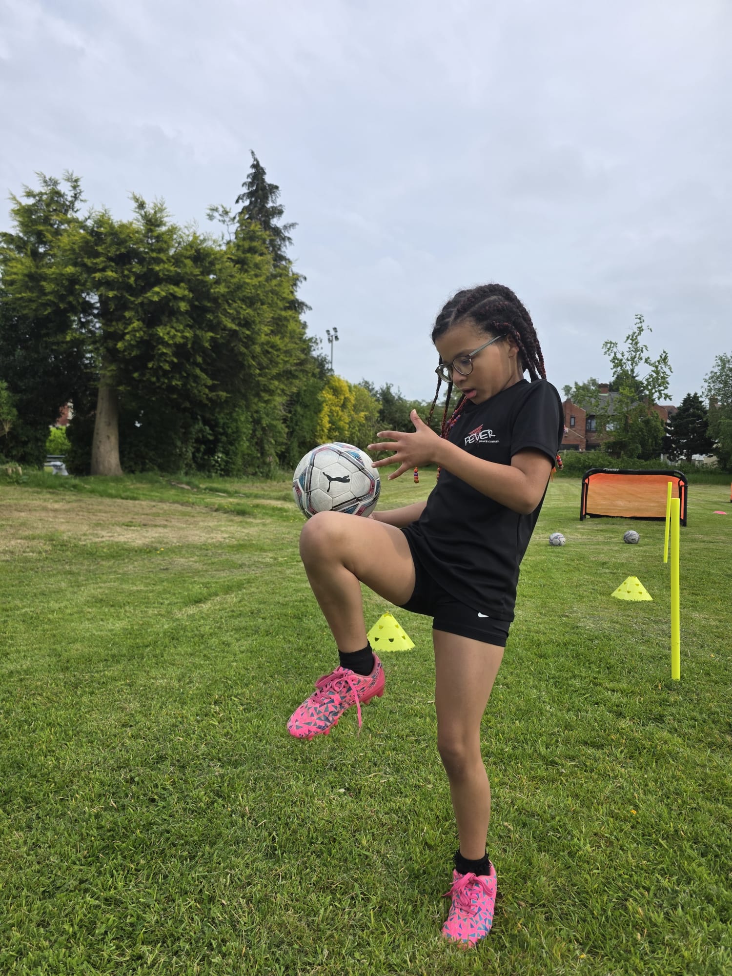 Dynamic soccer academy players speed training under floodlights